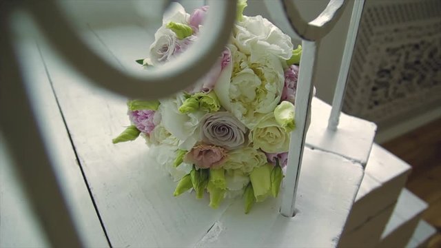 Rings newlyweds and a bride bouquet with accessories