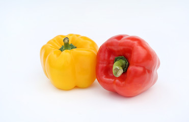 Yellow, red bell pepper isolated on white background.