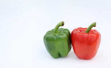 Green, red bell pepper isolated on white background.