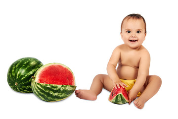 Fototapeta premium Cute little infant baby girl eating watermelon slice on white background