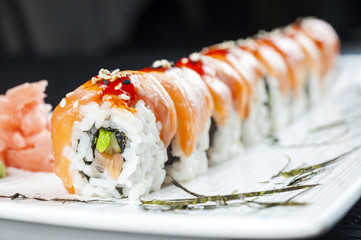 Sushi roll with salmon and shrimp tempura