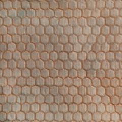 Electromagnetic shielding membrane with hexagonal embossed structures texture.