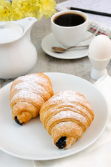 Morning coffee cup croissant