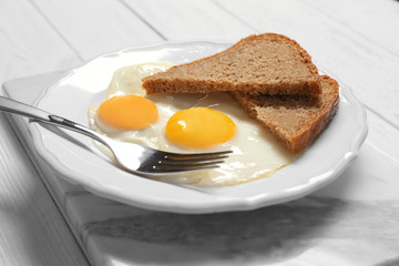 Delicious breakfast with over easy eggs on board