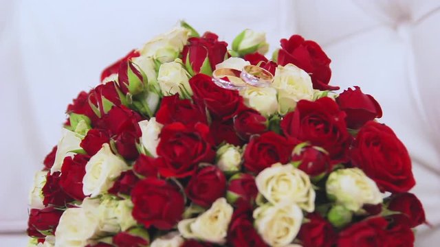 Rings newlyweds and a bride bouquet with accessories