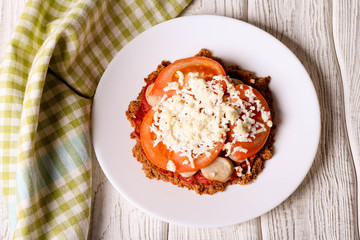Healthy pizza with sausage, cheese and tomato