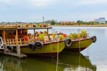 Fototapeta na wymiar Two Boats in river