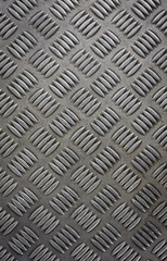Diamond sheet. Background of metal diamond plate. Background of old metal plate in silver color....