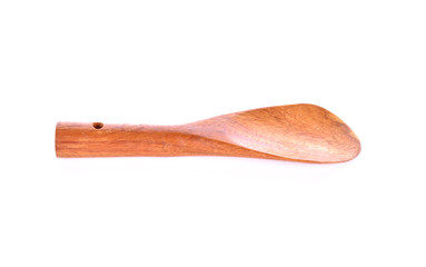 Wooden spatula on a white background