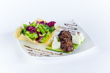 Close Up of Rack of Saucy Barbecue Pork Served on Plate in Restaurant