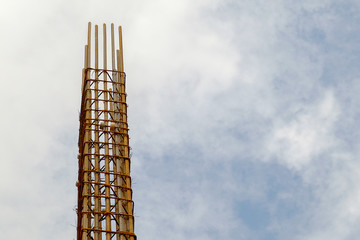 reinforce concrete column construction with sky background