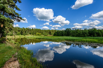 Obraz na płótnie Canvas reflection of clouds in the lake