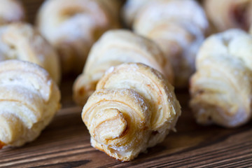 Homemade baking with fresh apricot filling. Closeup. Selective focus.