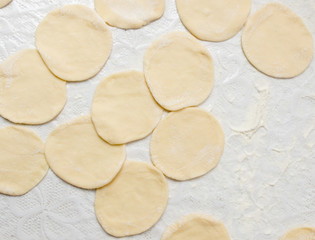 Cook cooks dough for pieces