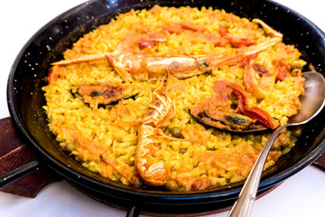 Prawn with rice - closeup of prawn with rice - traditionnal spanish food paella