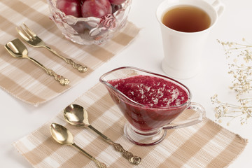 Jam from plum with tea