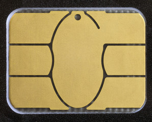 Macro shot of electronic chip on a credit card or debit card. Image for technology or finance...
