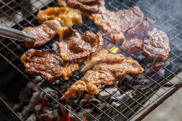 Beef  on the grill with flames