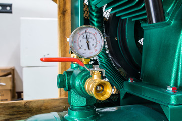 Presure gauge  gage in stall in a pressureed tank of an air pump machine