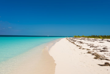 Fototapeta na wymiar Sandy beach Playa Paradise of the island of Cayo Largo, Cuba. Copy space for text.
