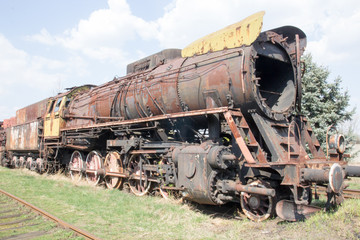 Fototapeta na wymiar Old rusty locomotive
