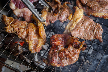 Beef  on the grill with flames