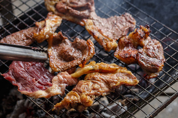 Beef  on the grill with flames