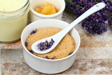 Homemade body scrub from granulated sugar, lavender flowers, coconut oil 