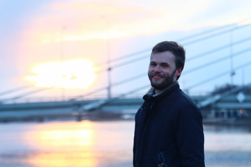 Portrait of young man in urban city.
