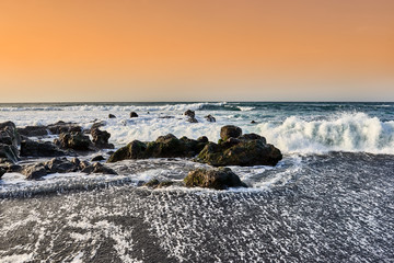 Fototapeta na wymiar Rocky Atlantic coast for Puerto de la Cruz, Playa de Jardin, Tenerife, Canary Islands