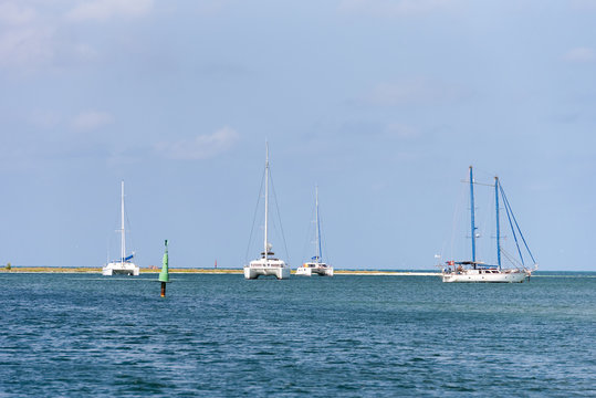 Fototapeta White yachts near the shore of the island of Cayo Largo, Cuba. Copy space for text.