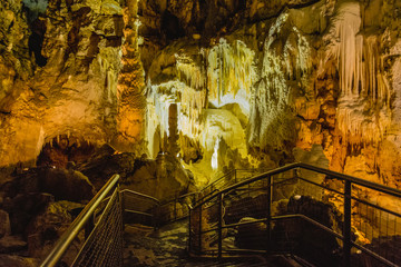 Fototapeta premium Formation of stalagmites and stalactites in the caves of Frasassi, Italy