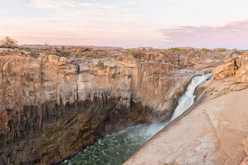 Main Augrabies waterfall at sunset