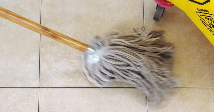 Cleaning floor using a mop
