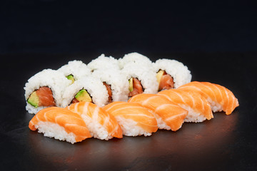 Sushi on black background. Perfect for creating sushi restaurant menu. Part of series.