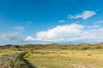 Beautiful landscape of mountains and blue sky with clouds.