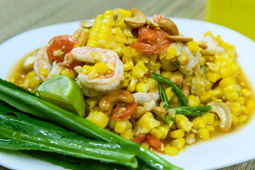 Pound corn with fresh shrimp