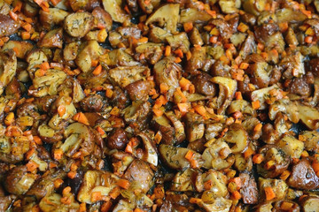 Fried mushrooms with carrots.