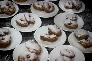 lots of donuts, donuts on plates, dessert, rolls in the dust