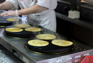 cooking pancakes, baking pancakes, toasted pancakes, chef preparing food