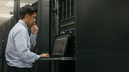 Administrator serious working with system in data center