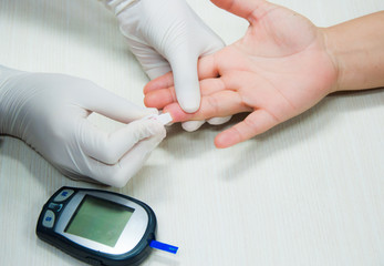 Medical technologist doing a blood draw examination in laboratory room. hospital