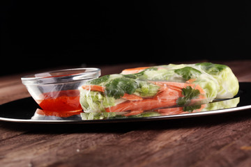 Vietnamese Salad spring roll, summer roll with vegetables, lettuce and rice noodles