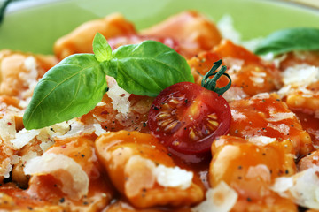 Ravioli with tomato sauce and basil