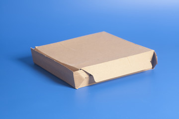 cardboard box on a blue background