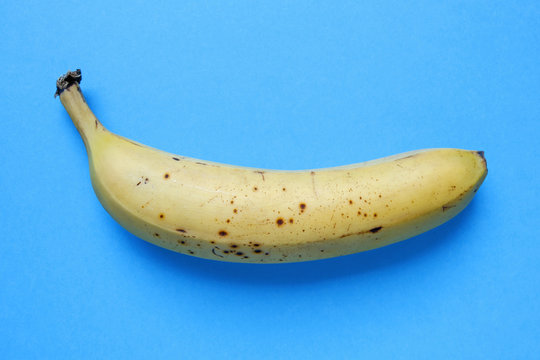 banana on blue background