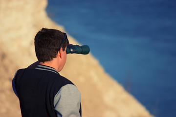 A man standing on the beach