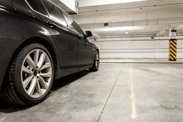 Underground parking, car parked in private garage 