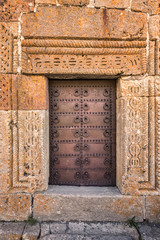 Door entrance to gergeti trinity church or Tsminda Sameba, Georgia.