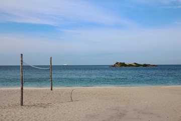 Beautiful tropical sea beach with  volleyball net in summer at Thailand.